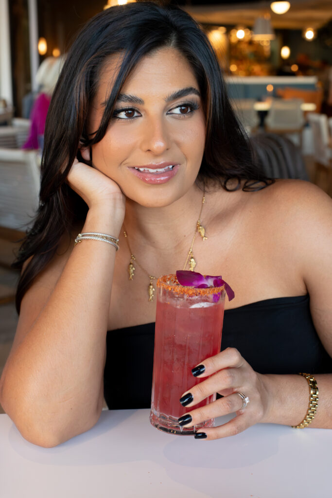 Gabrielle Troyer for Rooftop Collective with cocktail from LUMA St Pete