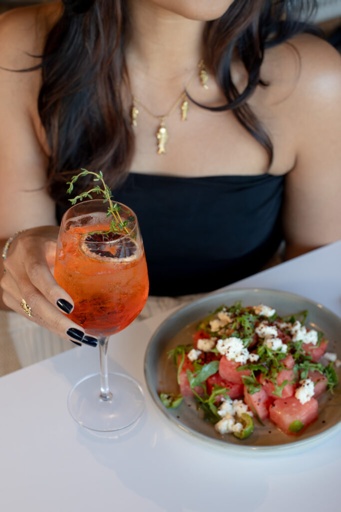 LUMA restaurant in St Pete offers the Thyme & Tide a spin on an Aperol spritz... prosecco, Aperol, mastika, thyme, and orange.